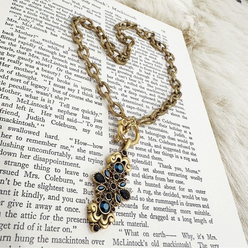 MYKA opulent gold toggle pendant necklace.